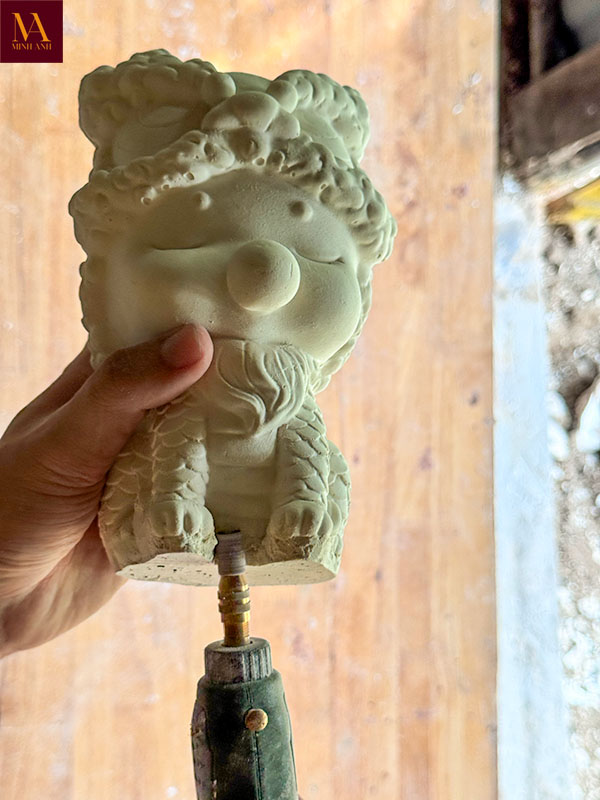 đánh bóng tượng thạch cao